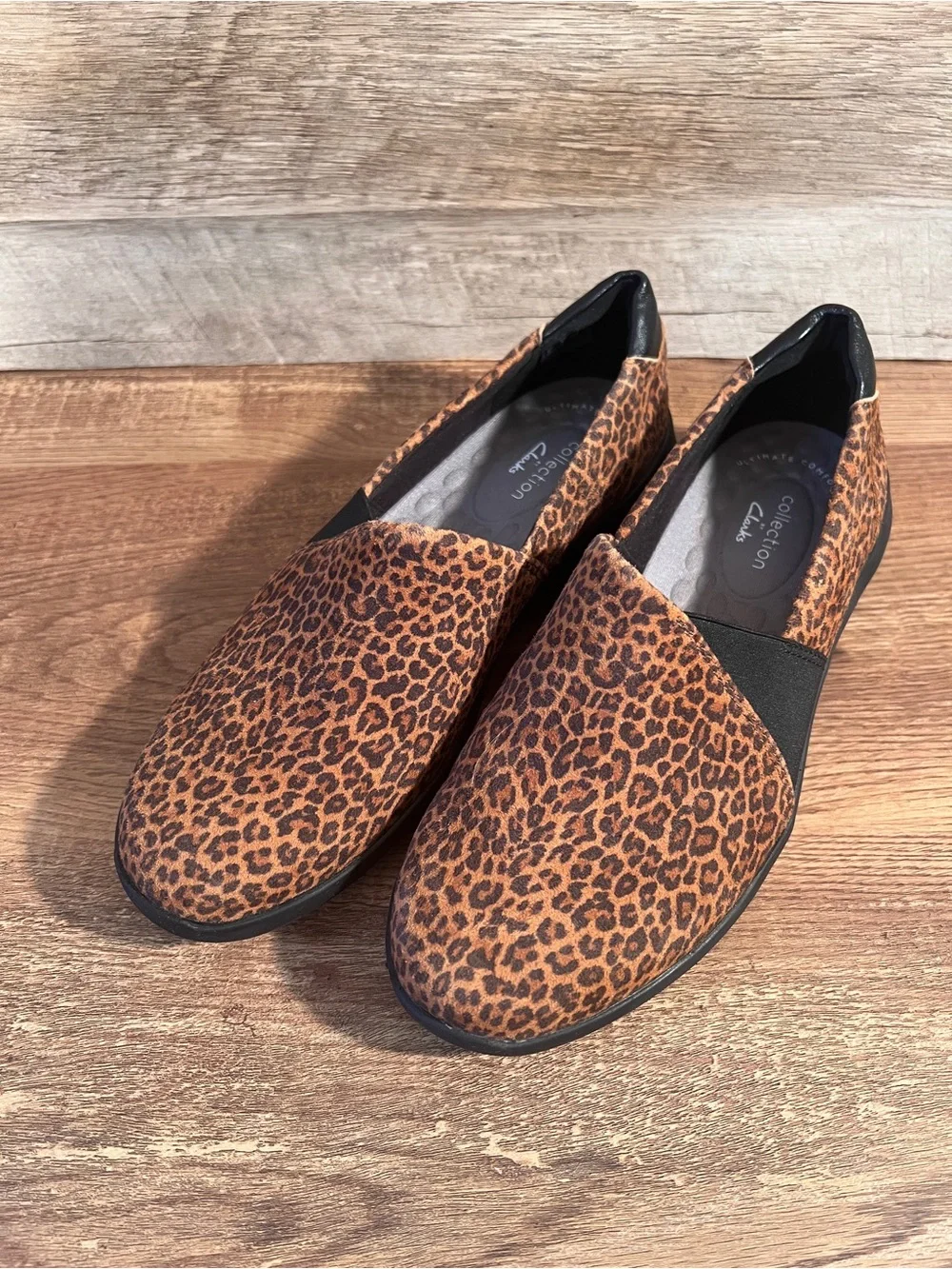 Clarks Cheetah Print Slip-On Flats in Brown and Black Kayleigh Step Loafers